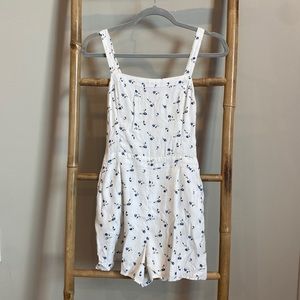 White and floral blue hollister romper